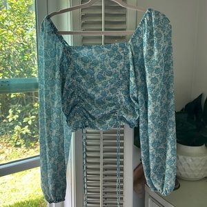 blue and white long sleeve crop top